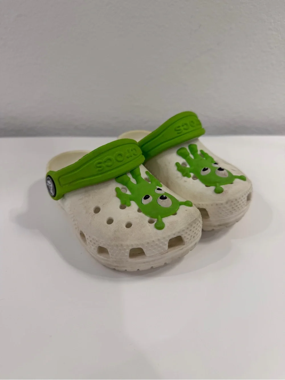 CROCS White Kids Clogs with Bright Green Monster Accents